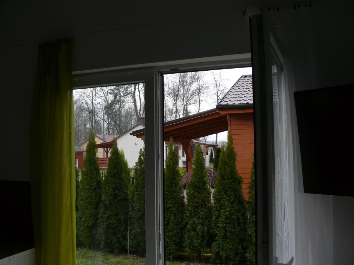 Domek Nad Jeziorem Osieczna Bagian luar foto